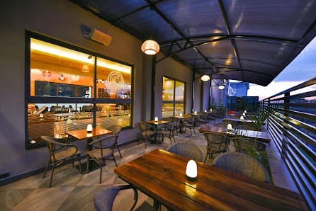 Caramel terrace with warm evening lighting